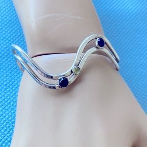 Julius Olaf Randall sterling silver Modernist cuff bracelet Peridot Amethyst